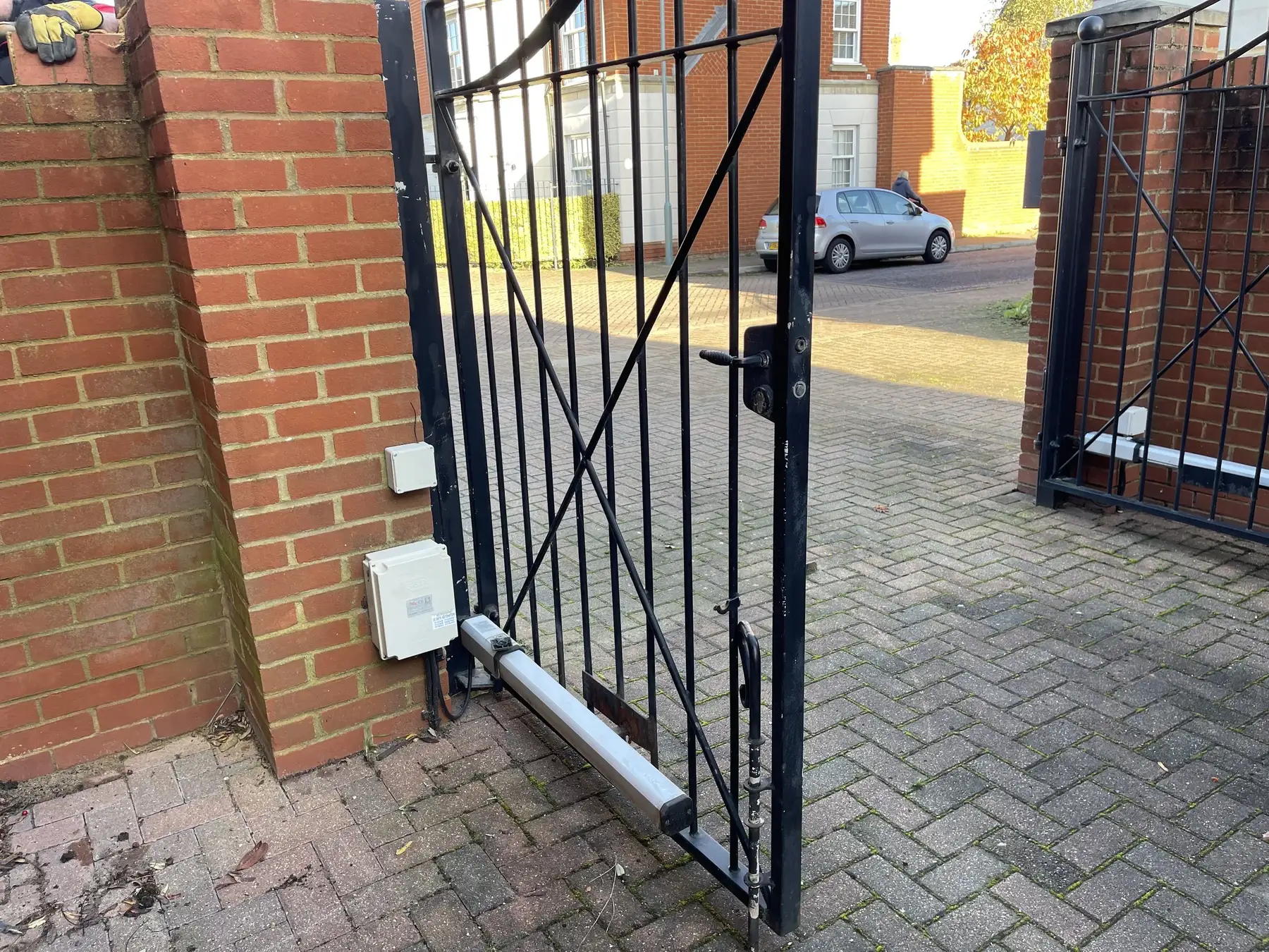 Old gate and retro fitted arms