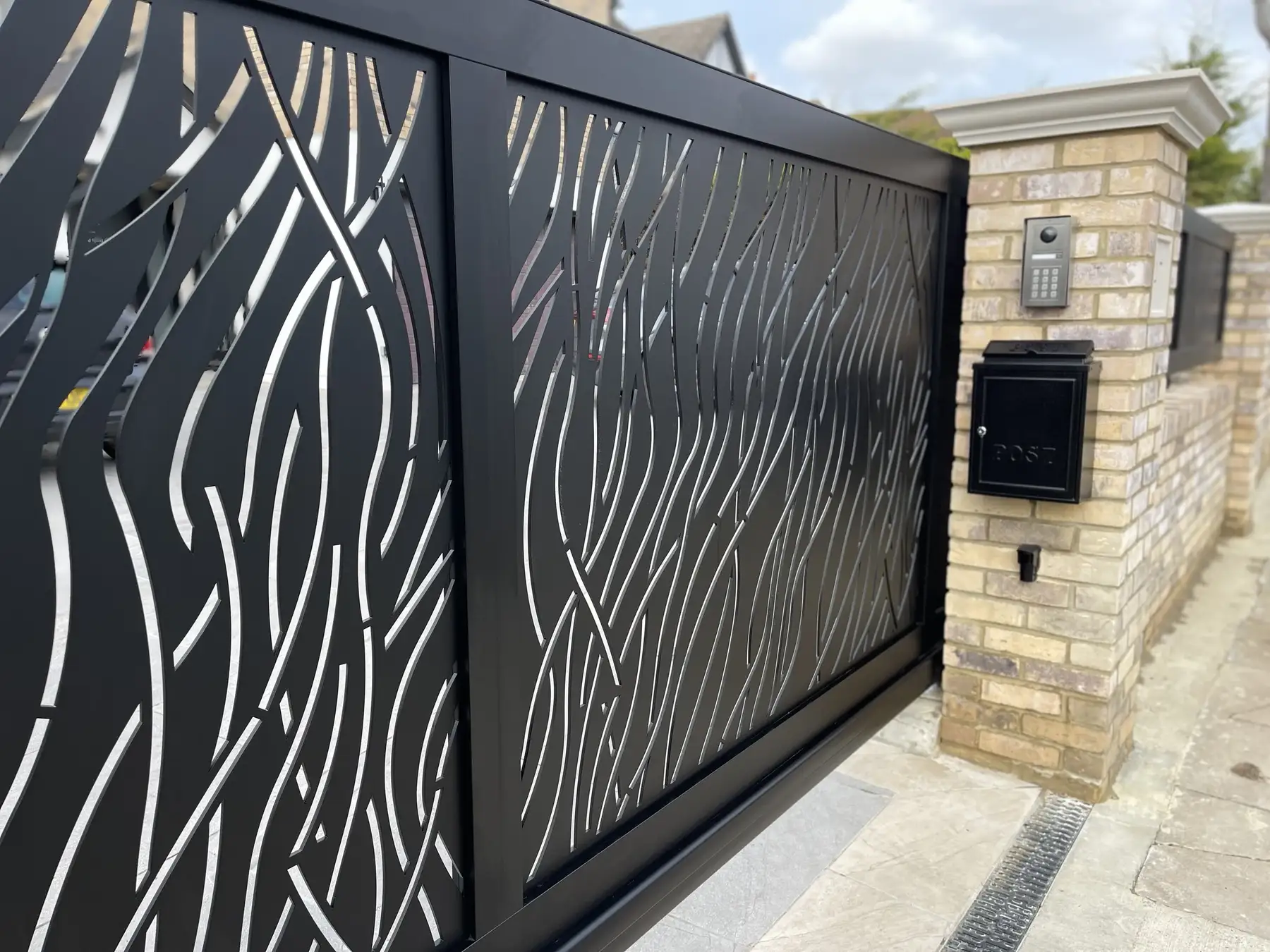 Safari laser-cut aluminium cantilever gates in Upminster, Essex