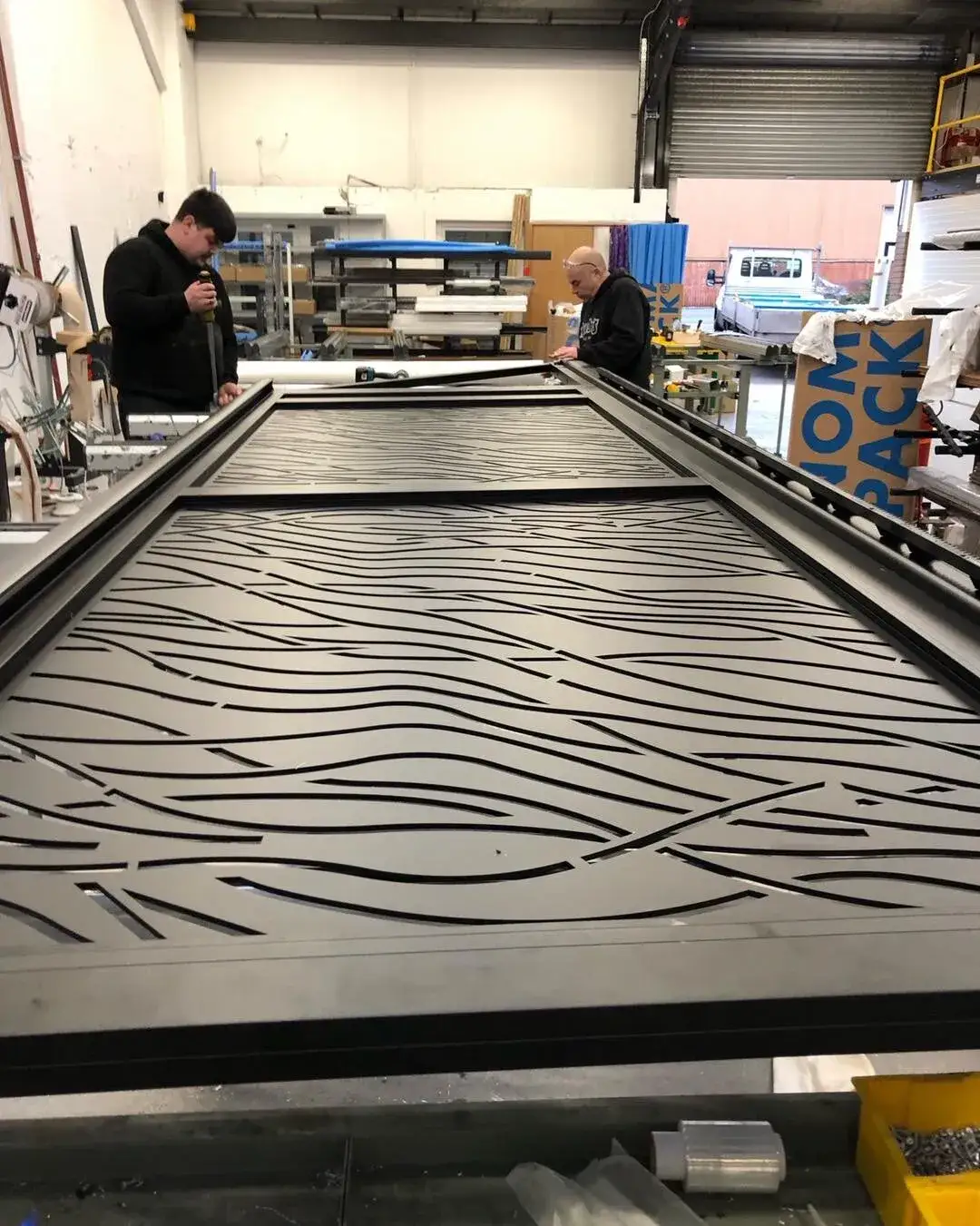 Gate fabrication in progress in workshop