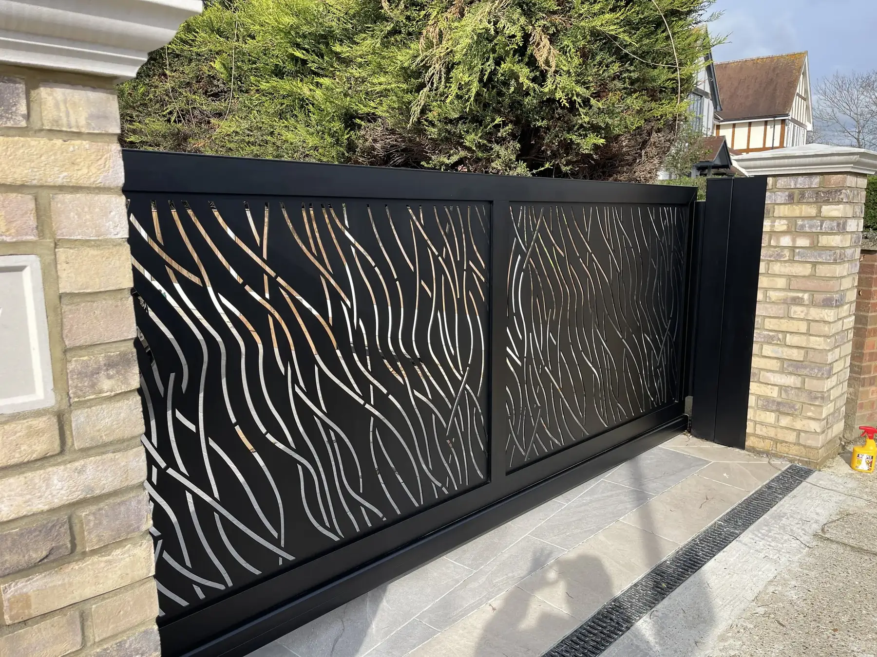 Safari aluminium gate detail showing laser-cut design
