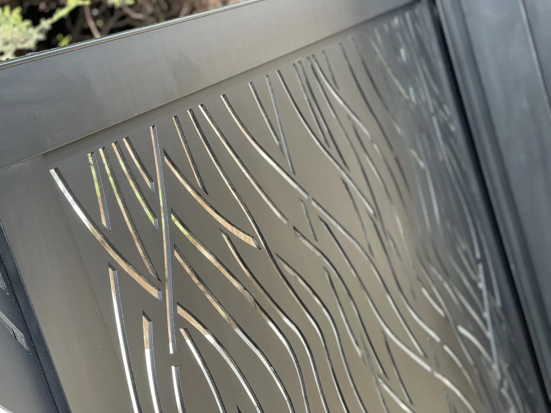 Safari laser-cut aluminium cantilever gates in Upminster